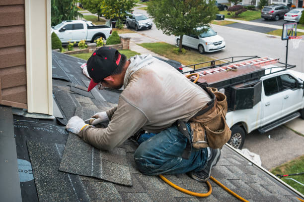 Professional Roofing technician working in Challis, ID